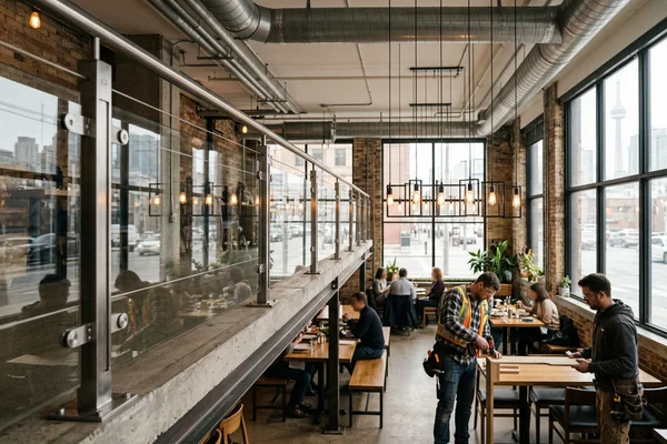 Steel and glass mezzanine guard in a downtown Toronto restaurant